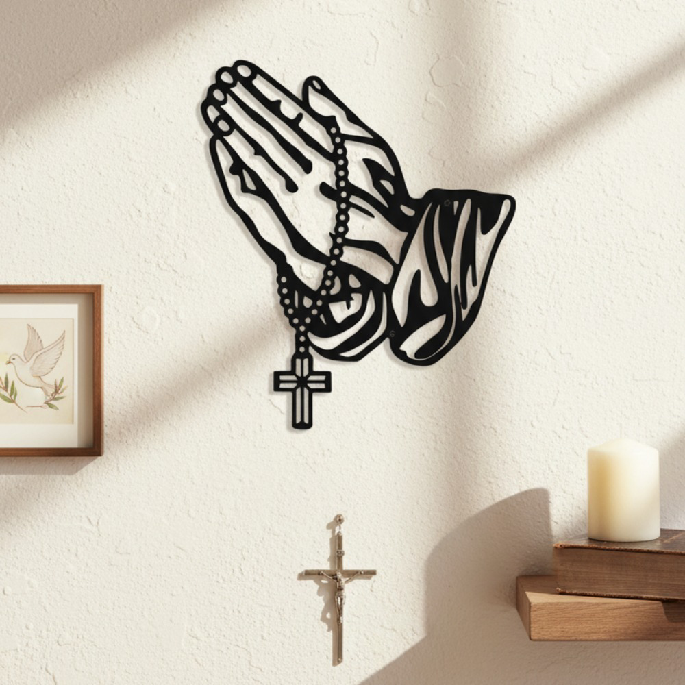 Black metal praying hands with rosary and cross wall art – on wall with crucifix