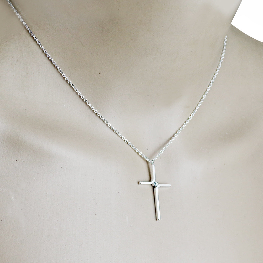 Simple titanium steel cross necklace, silver – worn on neck