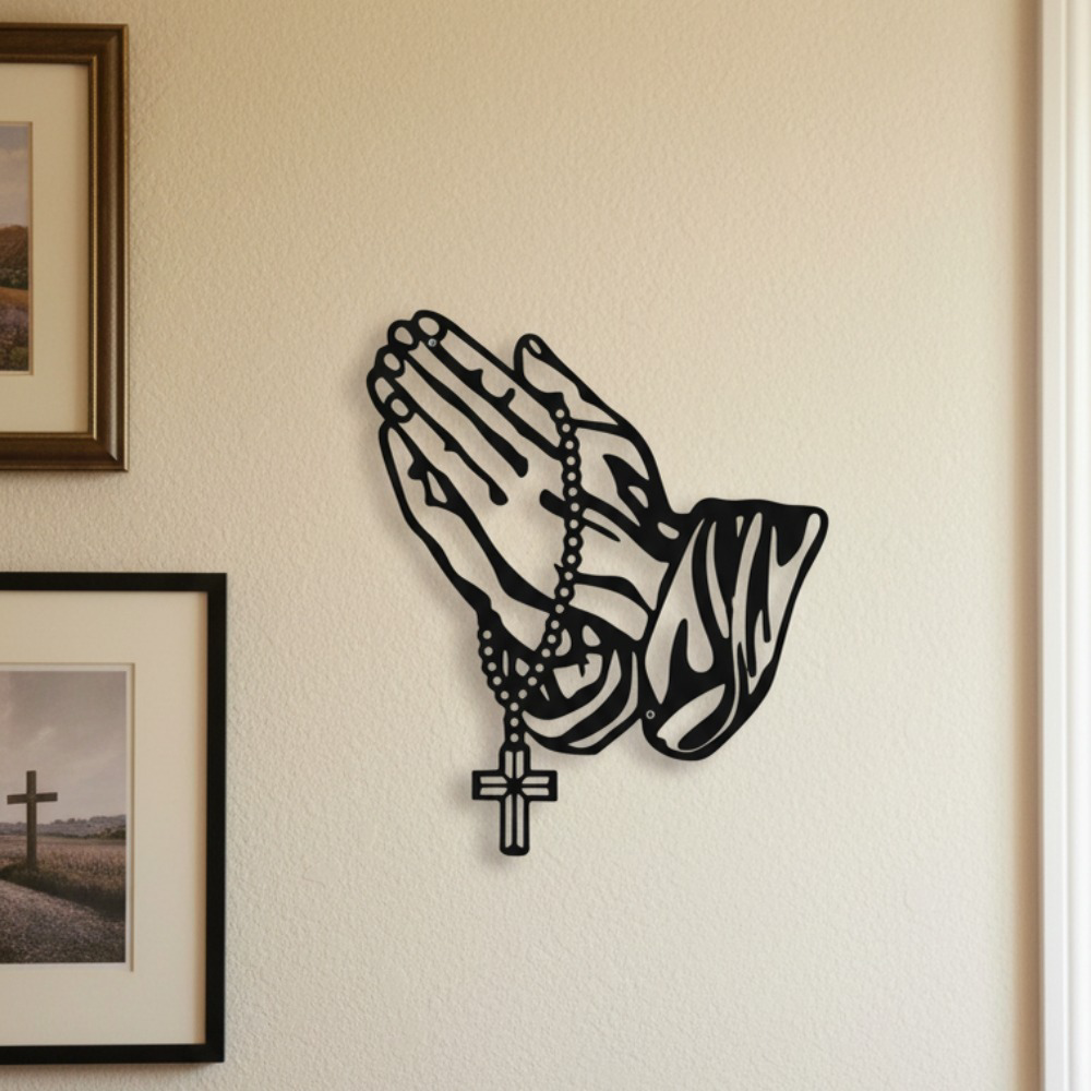 Black metal praying hands with rosary and cross wall art – on wall